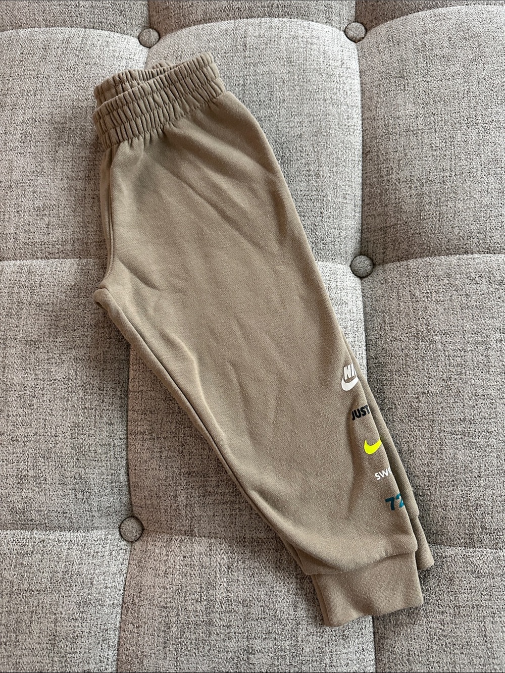 Nike Kids Tan Joggers with Multicolor Logo Accents